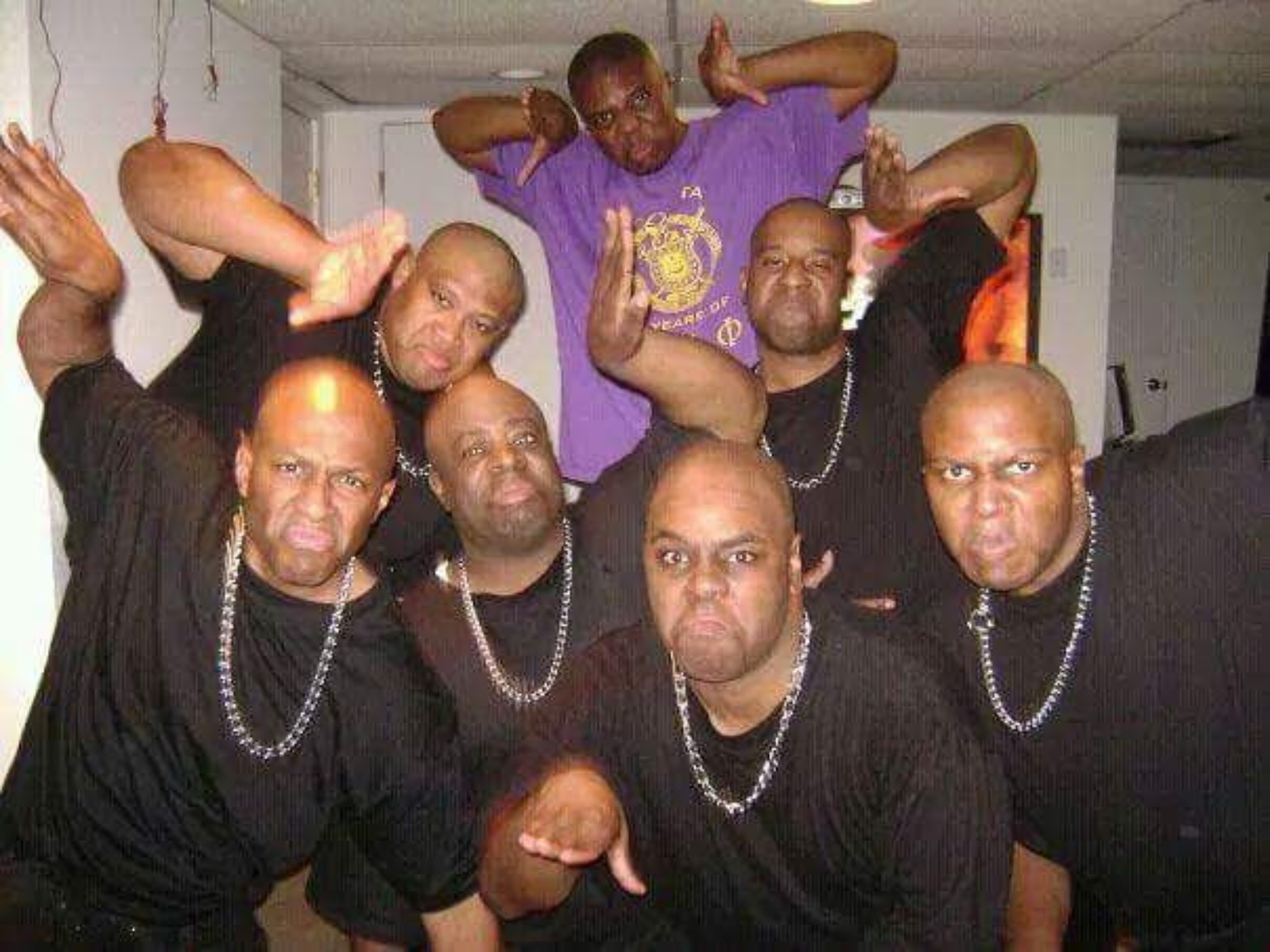 Fall 2009 line members posing together in black shirts